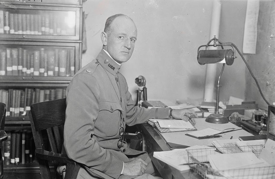 Willard Straight at work in an office in military uniform in 1917 during World War I