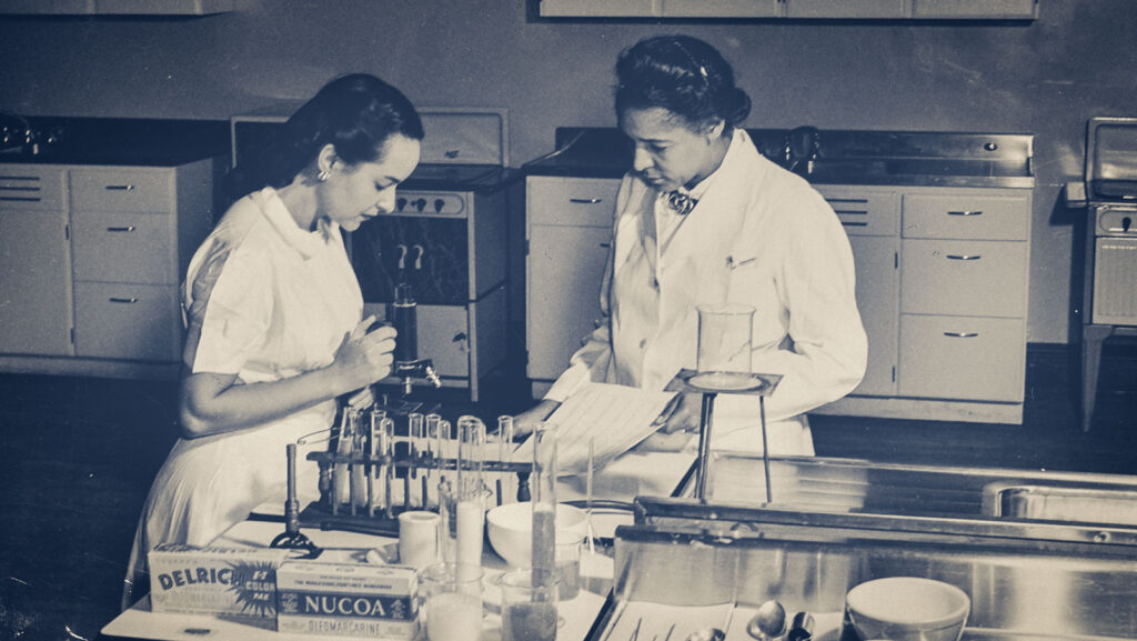 Flemmie Kittrell is pictured at work in the lab with a research assistant when she was director of home economics at Howard University