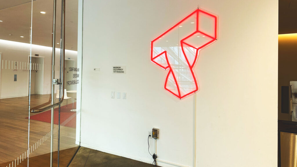 Cornell Tech's “Twisted T” graphic on the wall of a collaboration center on campus