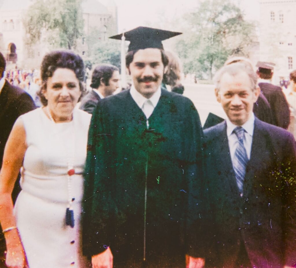 Arthur Mintz and his parents during his 1971 commencement.