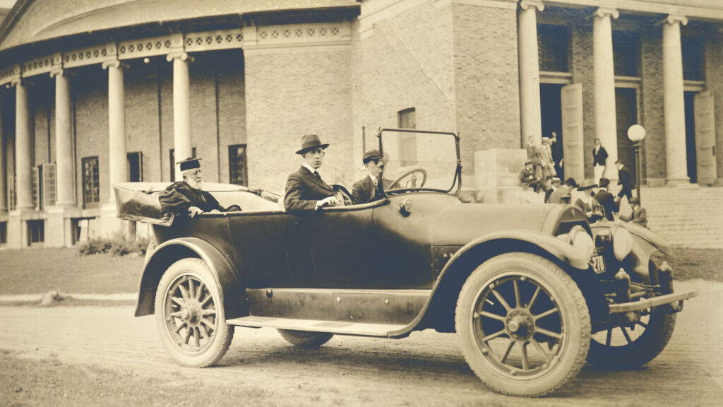 Andrew Dickson White in the back of an automobile on the way to events marking the 40th anniversary of Cornell's opening in 1908