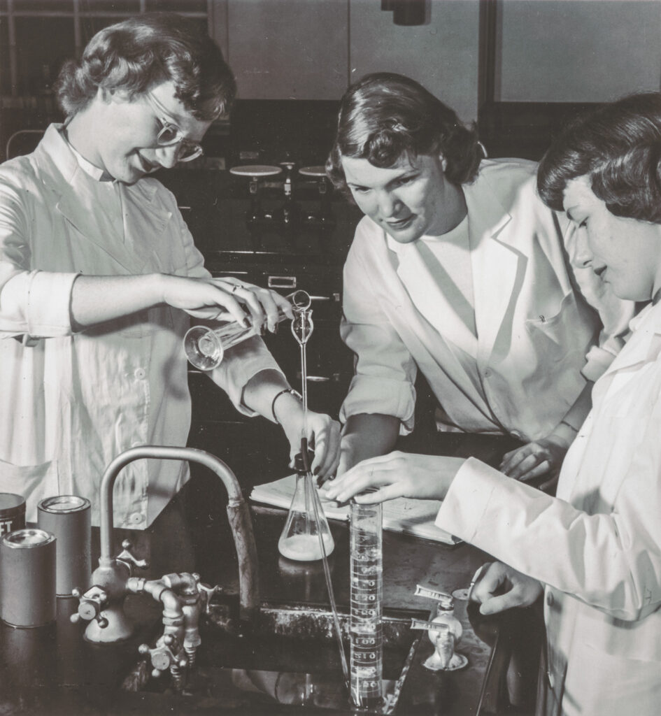 undated photo of home economics students in a laboratory