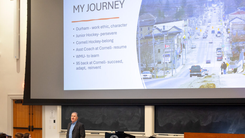 Head Hockey Coach Mike Schafer speaks to a crowded auditorium in Baker Hall as his “Last Lecture” on Wednesday, April 23, 2025. (Ryan Young / Cornell University)