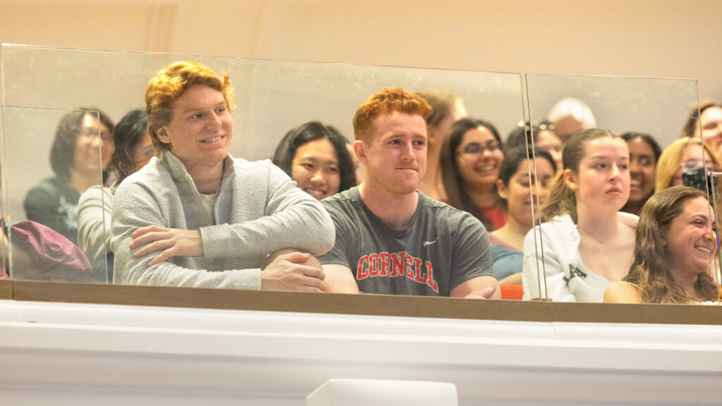 Students listen as Head Hockey Coach Mike Schafer speaks to a crowded auditorium in Baker Hall as his “Last Lecture” on Wednesday, April 23, 2025. (Ryan Young / Cornell University)