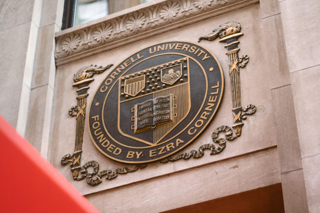 The Cornell emblem and insignia, as it appears on the facade of the Cornell Club–NYC in Manhattan