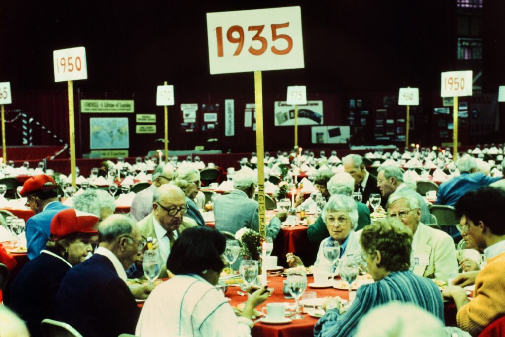 Class year signs mark the crowded tables in Barton Hall during Reunion 1985