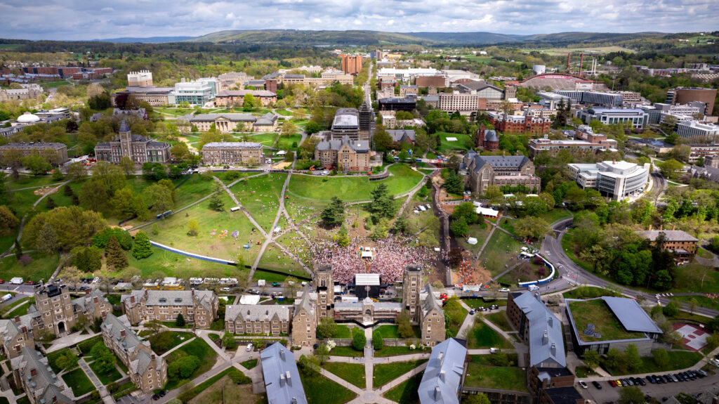 An aerial view of the campus on Slope Day showing the stage and crowd from above.