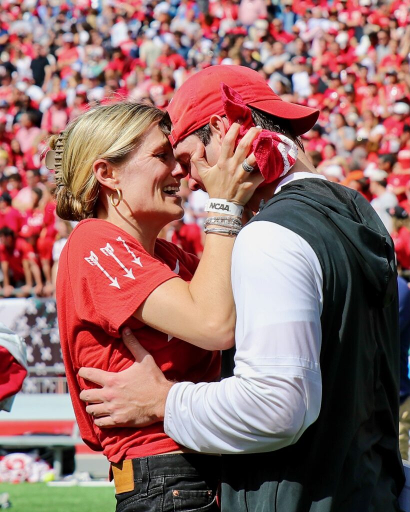 Connor Buczek celebrating the lacrosse win with fiancée Madeline Kiep ’16.