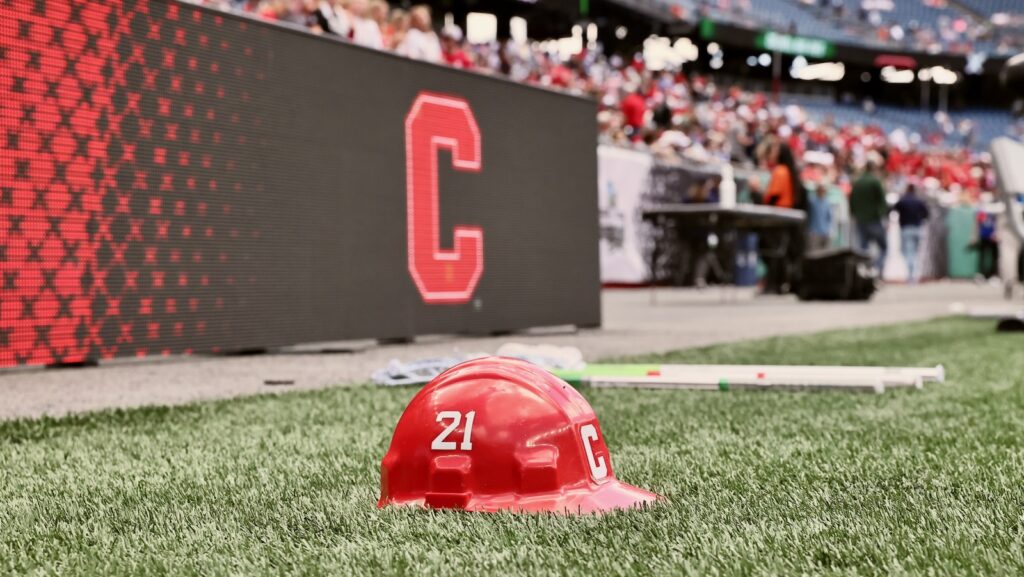 A helmet with the number 21 on the sidelines.