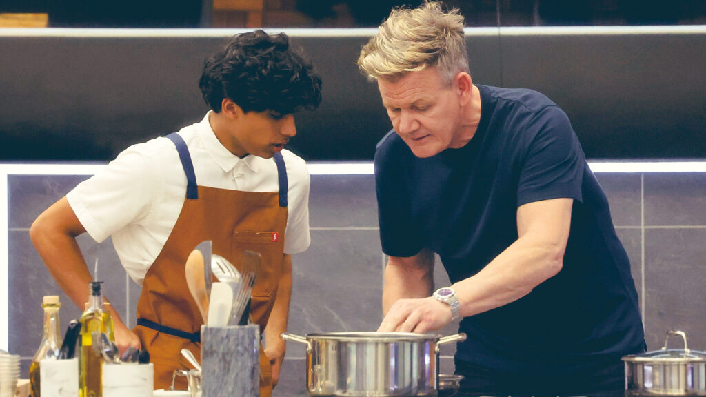 Gordan Ramsay and Arnav Kamulkar in the kitchen cooking together during Next Level Chef.
