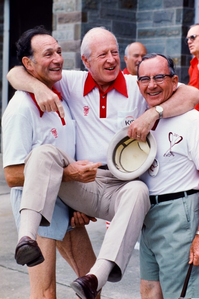 Austin H. “Kip” Kiplinger ’39, then about to begin his term as Cornell Board of Trustees Chair, enjoys a light moment with classmates at his 45th Reunion in 1984