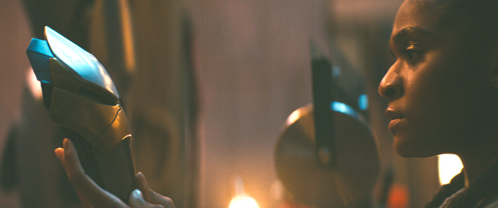 Riri Williams/Ironheart (Dominique Thorne) holds up a mask in Marvel Television's IRONHEART