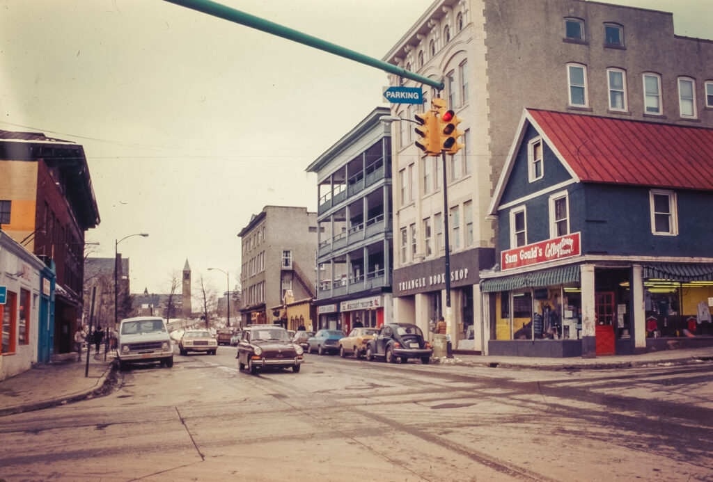 College Avenue, looking north at Dryden Road, with views of Sam Gould's Collegetown Store and the Triangle Book Shop, 1980