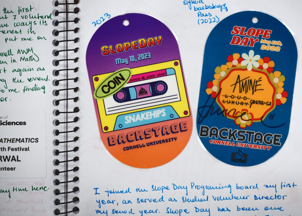 page of a student's scrapbook made for final project for AMST 2001 course showing Slope Day backstage passes and written entries