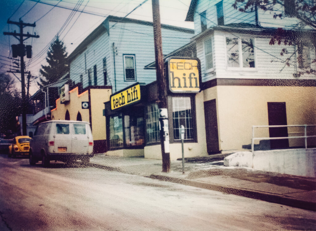 Dryden Road, with the Royal Palm Tavern and Tech Hifi storefronts, late 1970s