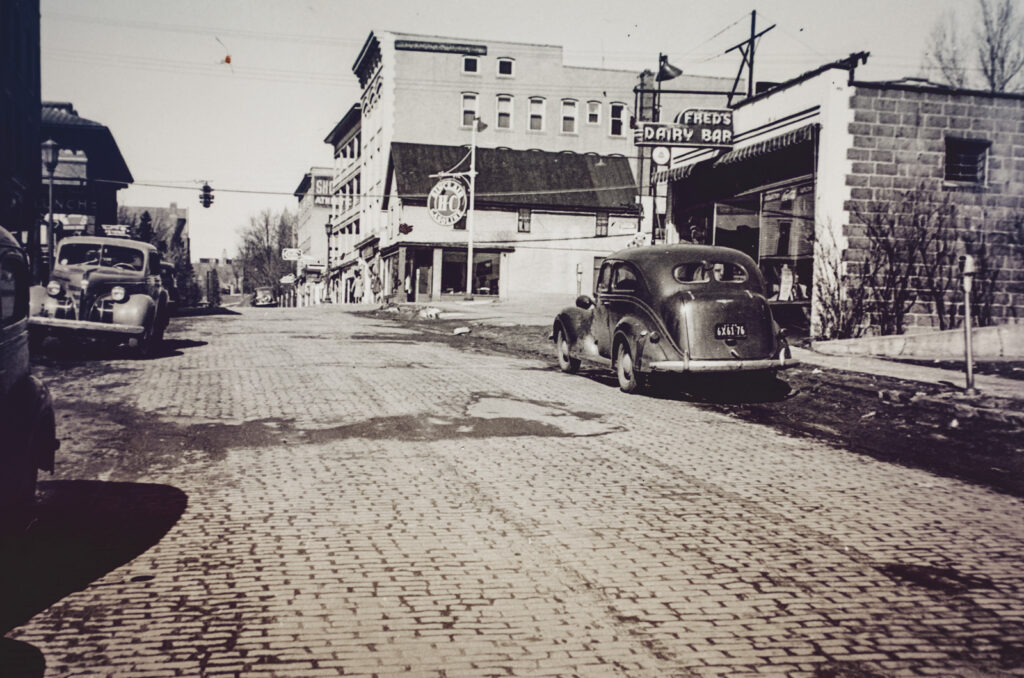 a cobblestoned College Avenue just south of the intersection with Dryden Road, 1930s