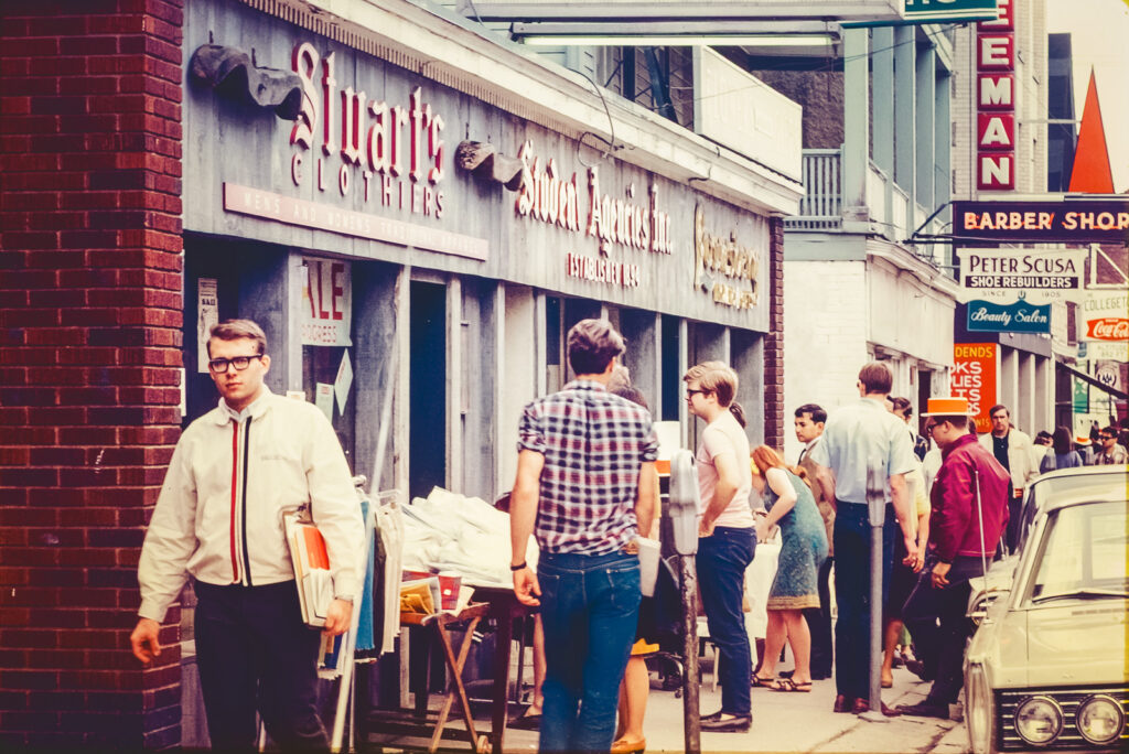 A sidewalk scene in Collegetown, 1967