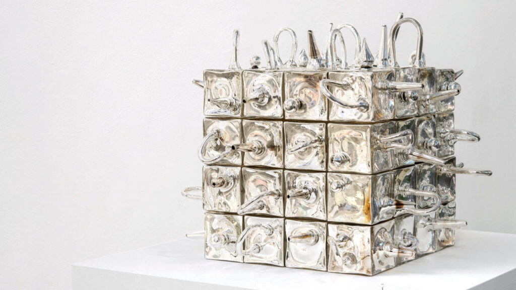 A cube-shaped glass artwork