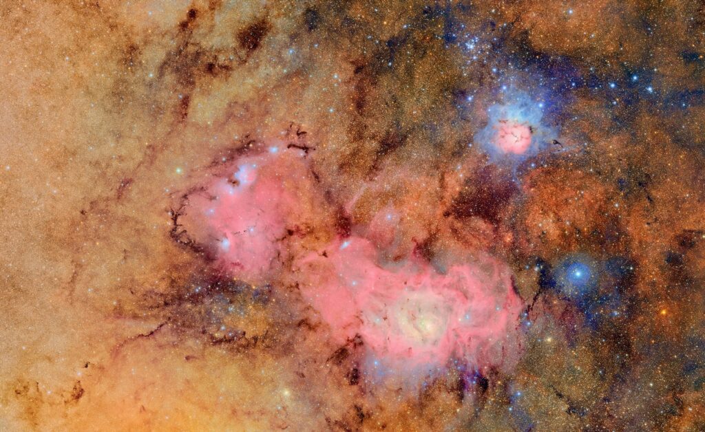 This image combines 678 separate images taken by the telescope in seven hours of observing time. It shows the Trifid nebula (top right) and the Lagoon nebula, which are within our own galaxy and several thousand light-years from Earth.
