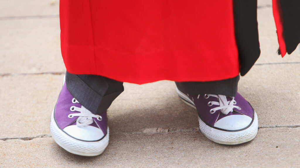 Jonathan Brand’s signature purple Chuck Taylors, which he wore at his inauguration and at subsequent commencements at Cornell College