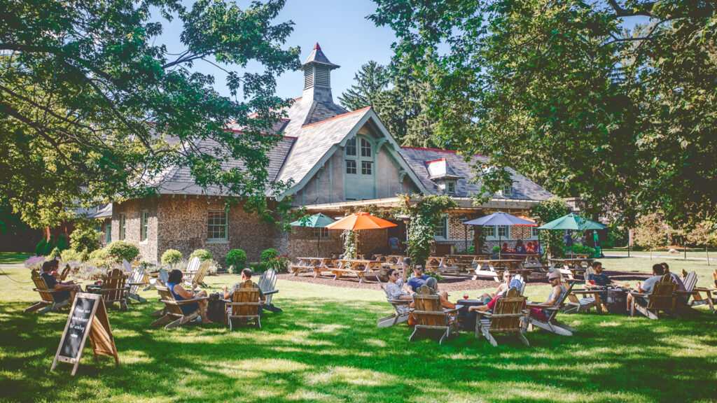 Guests relax in the beer garden outside Brewery Ardennes Taproom and Kitchen