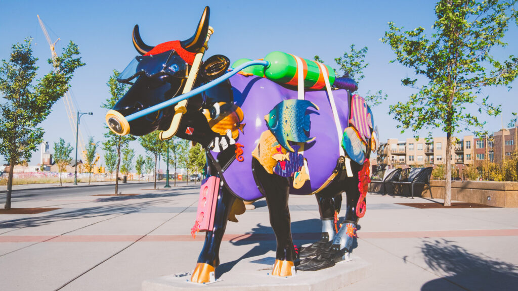 A fiberglass cow wearing scuba gear