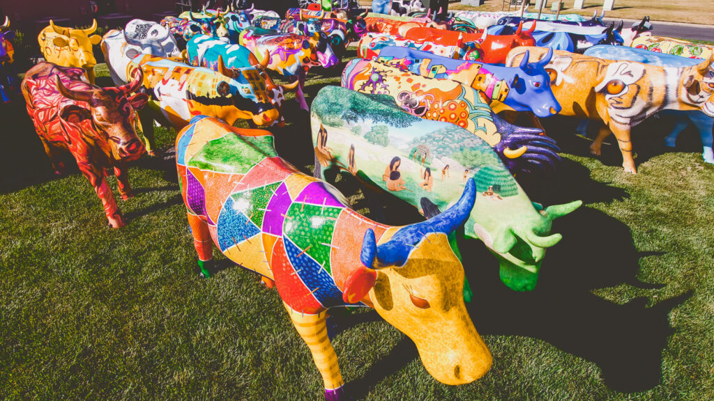 A group of painted fiberglass cows