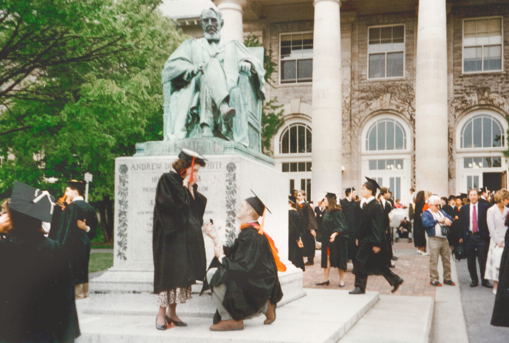 At Commencement 1995, Derek proposes to Stacey at the A.D. White statue on campus