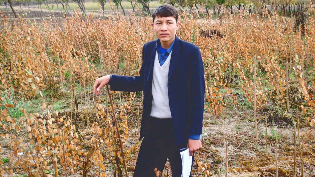 Hamidullah Nikzad doing fieldwork in a garden in Herat City