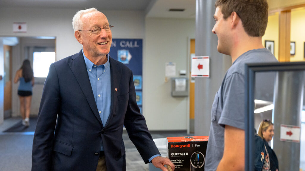 Cornell President Mike Kotlikoff greets a student during Move-In Weekend, 2025