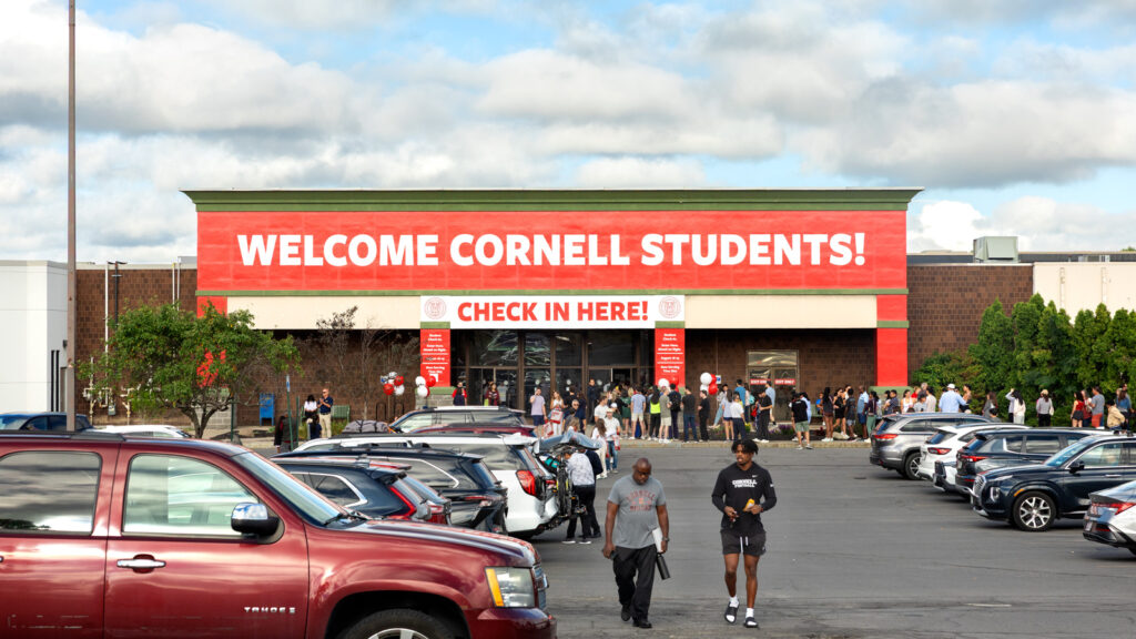 The welcome center at the Ithaca mall sees lines of students to check in for Move In Weekend, 2025