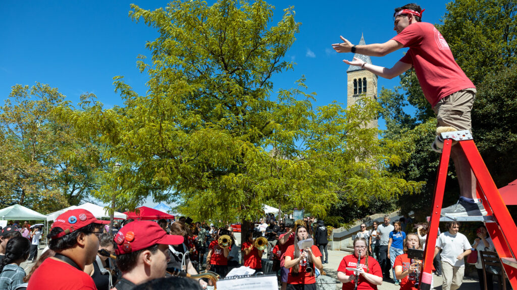 The Big Red Marching Band plays on Ho Plaza during Move-In Weekend, 2025