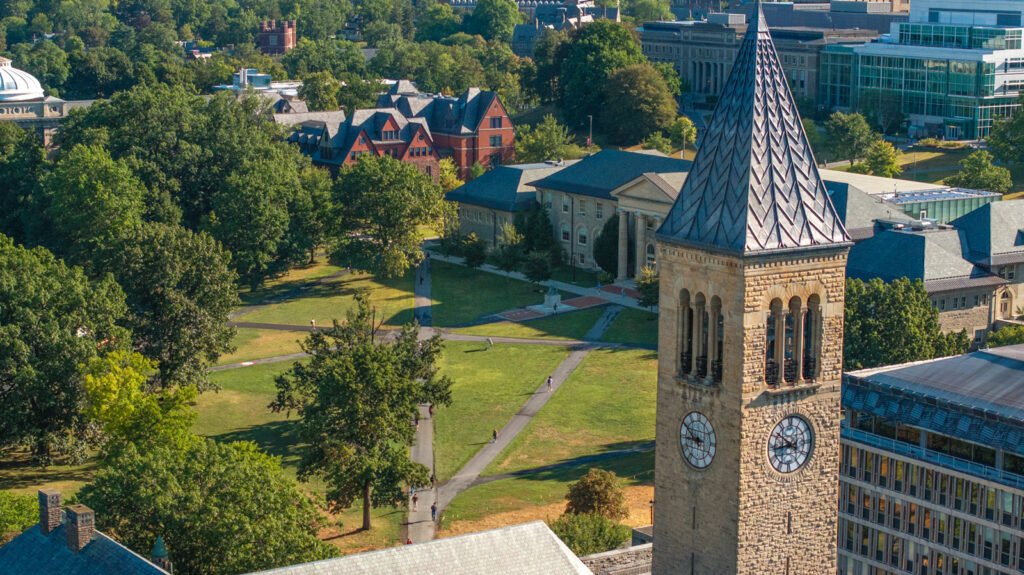 A view of the top of the clocktower and the Arts Quad with students walking to classes on the opening day of fall semester 2025.