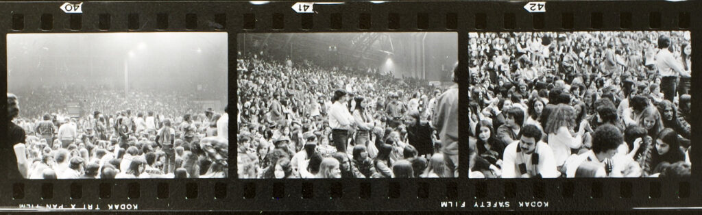 three frames of a contact sheet from 35mm negatives of the crowd at the February 1974 Joni Mitchell concert in Barton Hall