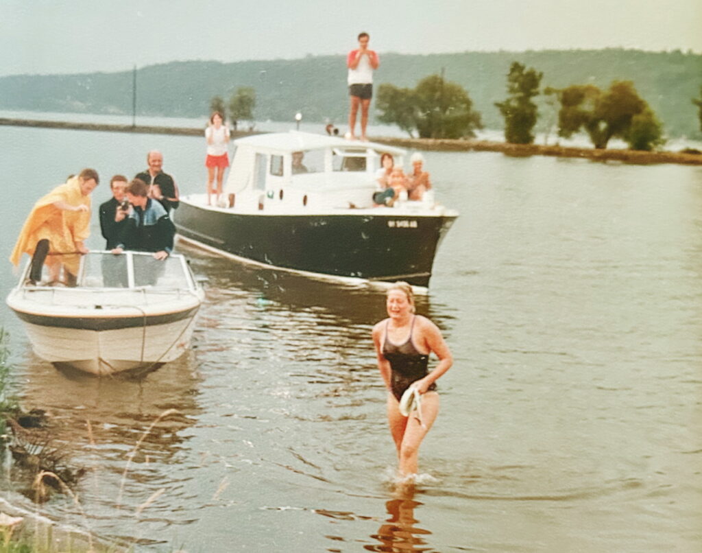 Claire De Boer emerges from the water after her swim in 1984