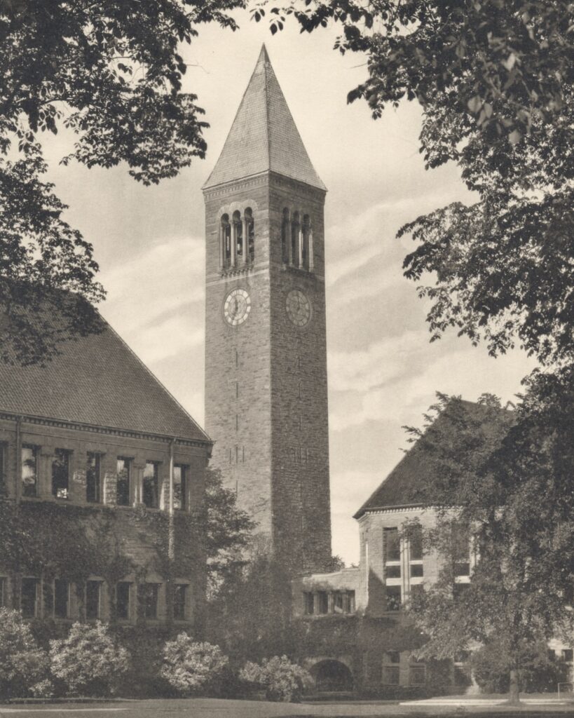 1920s-era view of McGraw Tower with its original tile roof, with Boardman Hall to the left and Uris Library at right
