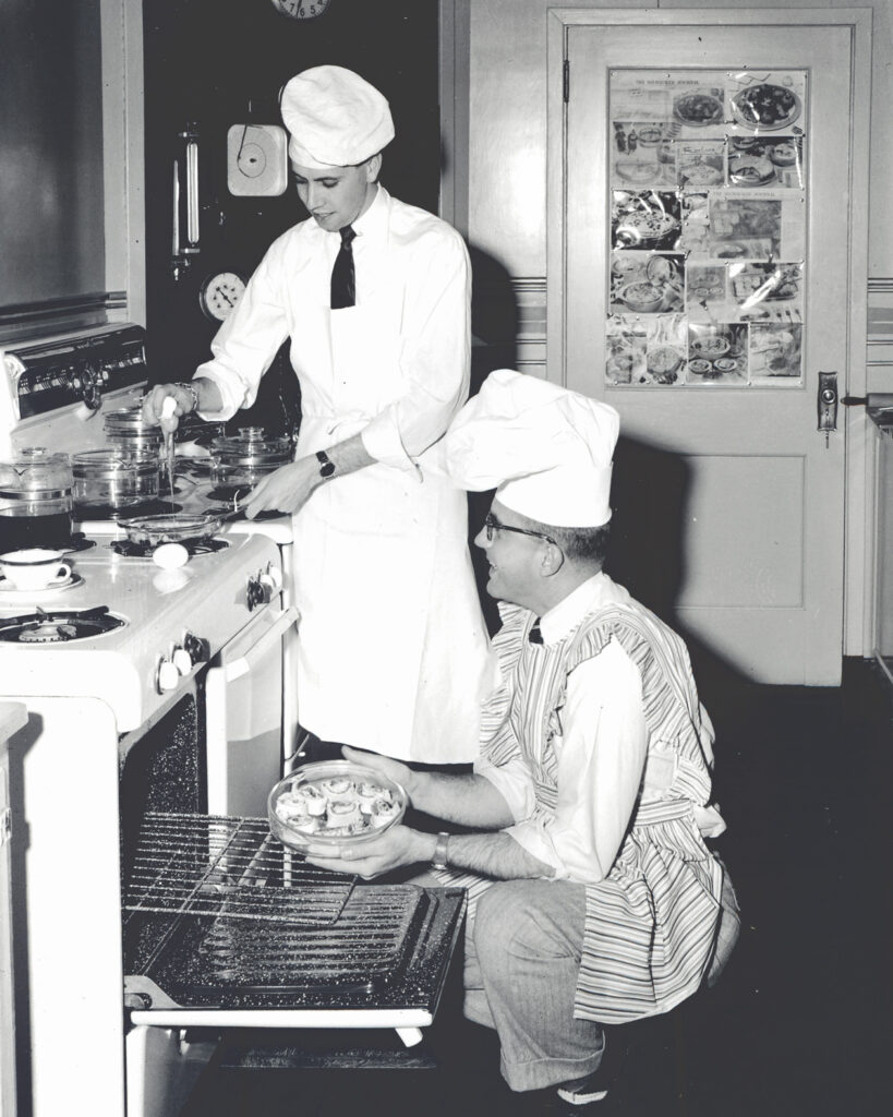 men in the Pyrex Test Kitchen in an undated photo
