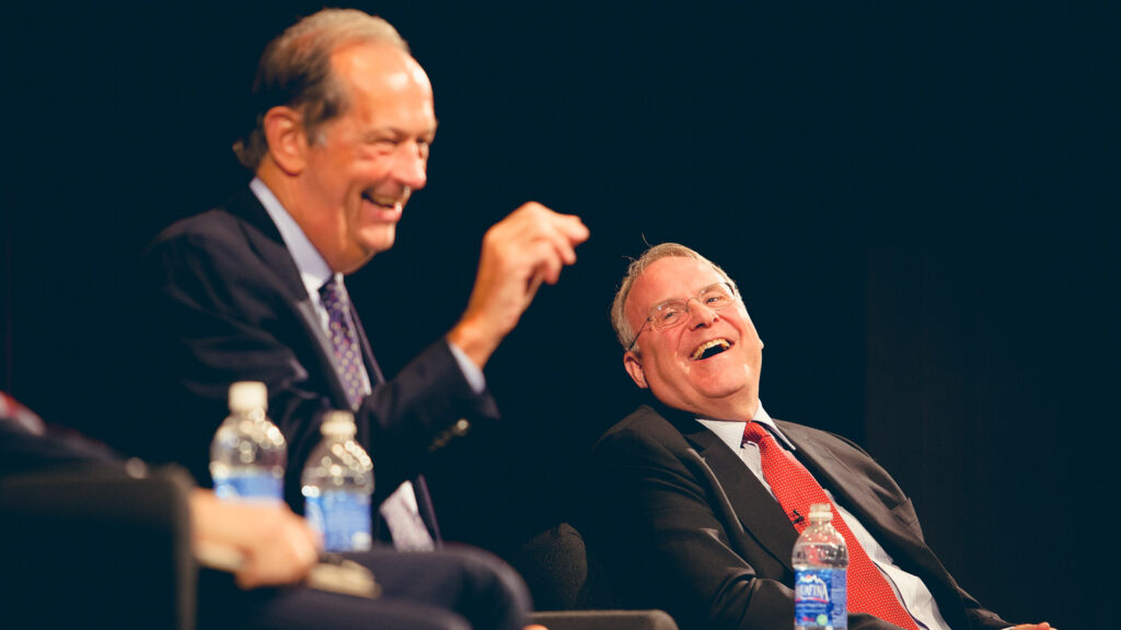 Ken Dryden, right, and Bill Bradley, a former U.S. senator, share a light moment at a 2009 Bailey Hall talk, "Lives on the Run: Sports, Service and Leadership"