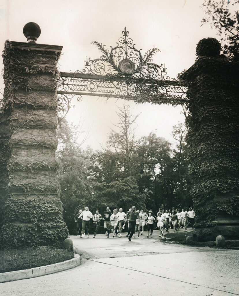 Eddy Gate, designed by William H. Miller, is shown in 1963 as Peace Corps candidates run through it