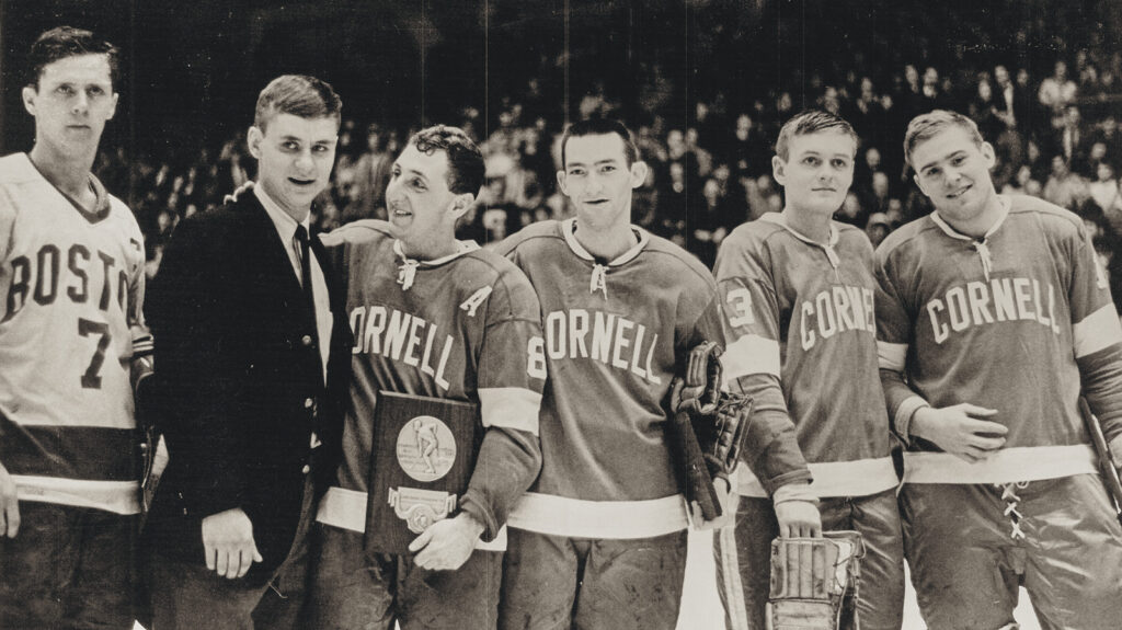 From right: Big Red players Ken Dryden, Walt Stanowski, Harry Orr, and Mike Doran; Michigan State's Tom Mikkola; and Boston University's Mike Quinn at a 1966–7 all-tournament team game