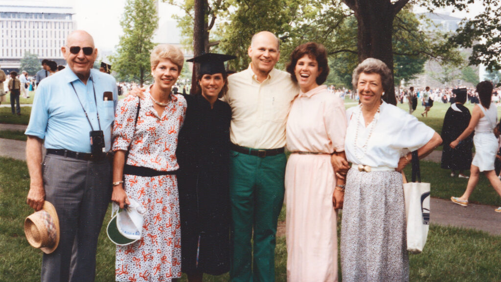 Anne Meinig at her 1987 graduation on the Arts Quad with family members Carl Meinig ’31; Nancy Schlegel Meinig ’62; Peter Meinig ’61, BME ’62; Kathryn Meinig Geib, MBA ’93; and Betty Meinig