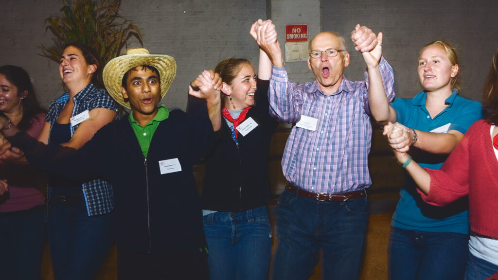 Peter Meinig ’61, BME ’62, second from right, at a square dance in 2007 at the Cornell Livestock Pavilion, held as an event for the Meinig Family Cornell National Scholars to meet and mingle with members of the Meinig family