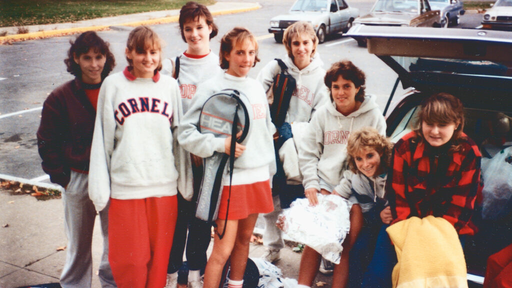 Anne Meinig, third from right, with other members of the Big Red women's tennis team, pictured in fall 1986 at a U Penn parking lot for a game