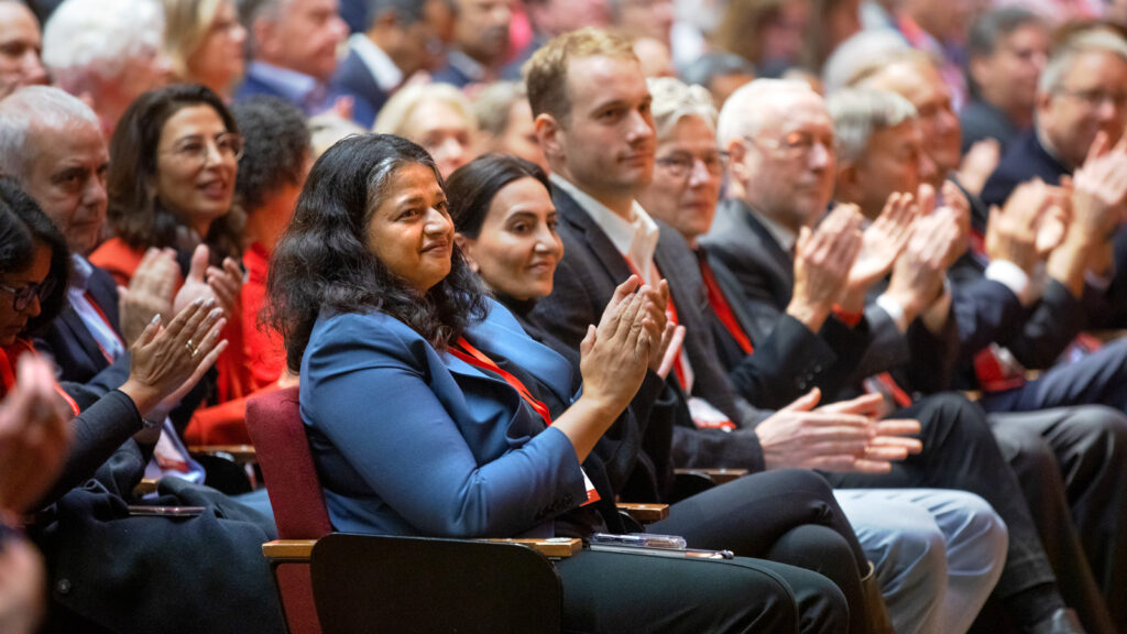Provost Kavita Bala applauds preceding the annual State of the University address during the Trustee Council Annual Meeting, Oct. 24, 2025, in Call Auditorium.