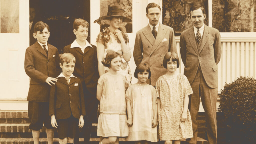 Dorthy Elmirst poses with her groom and children at her wedding to Leonard Elmhirst in 1925