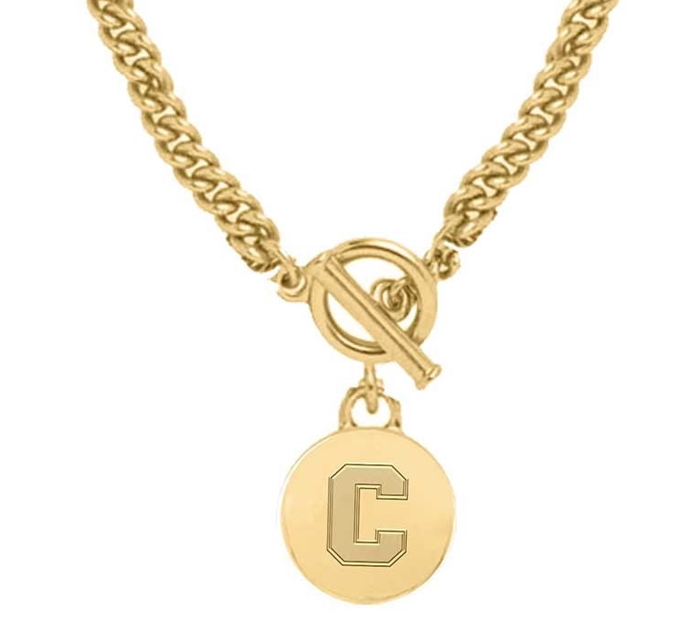 A gold necklace with a Cornell "C" logo charm.