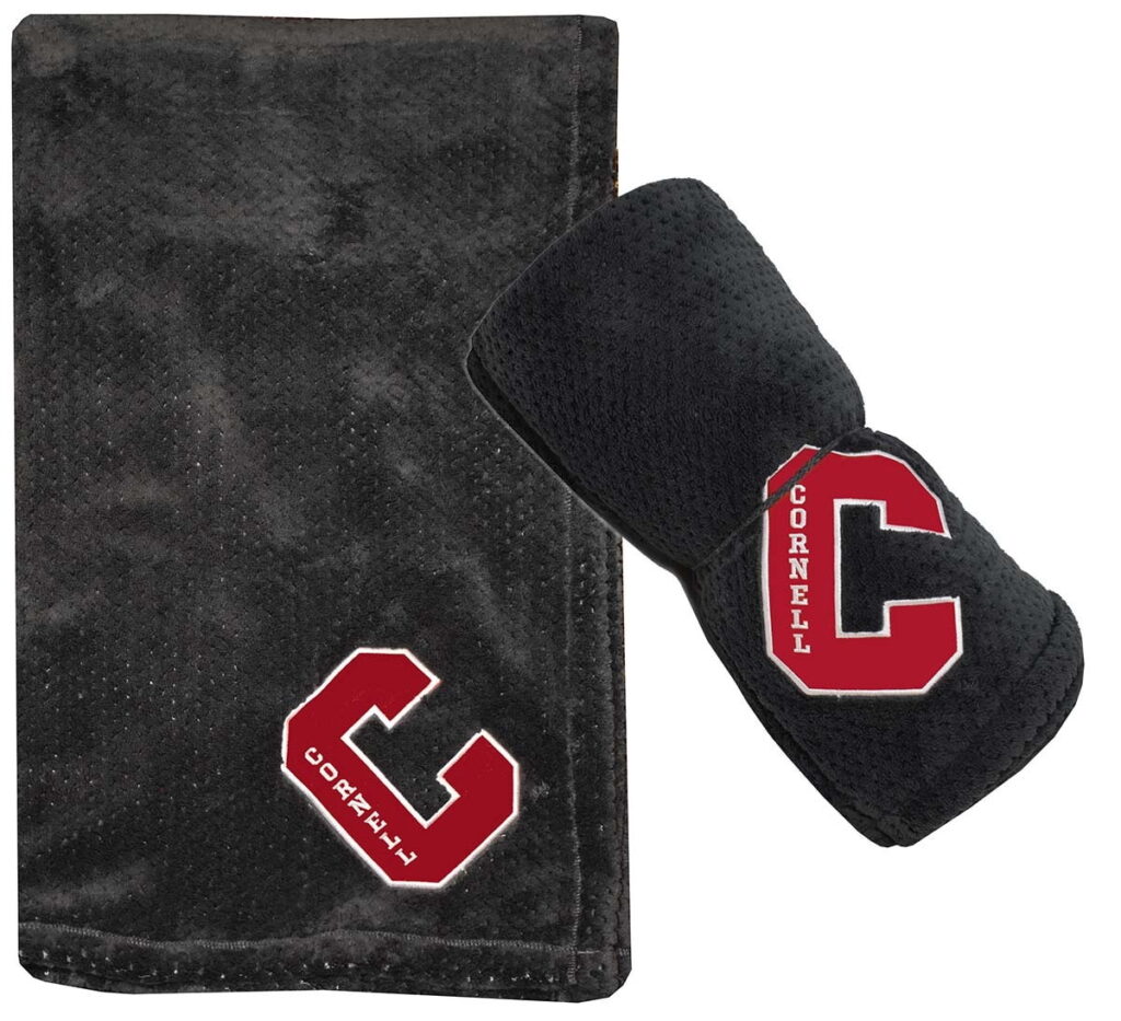 A black blanket with the Cornell logo on it.
