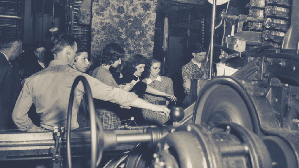 ILR students visit a factory floor in the 1950s as part of the popular “bus riding” course, a staple of the ILR curriculum at the time, that took undergrads on field trips to Pennsylvania mines and New York state factories