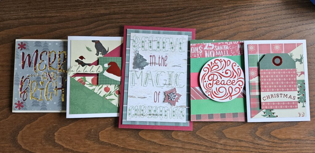 An array of 5 handmade christmas cards