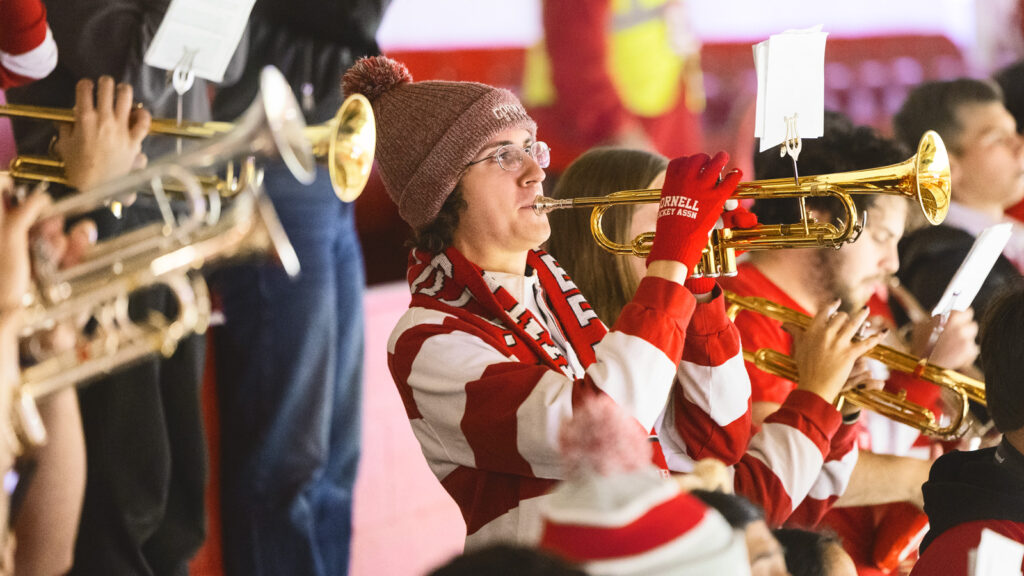 members of the Pep Band horn section play in Lynah Rink in November 20925